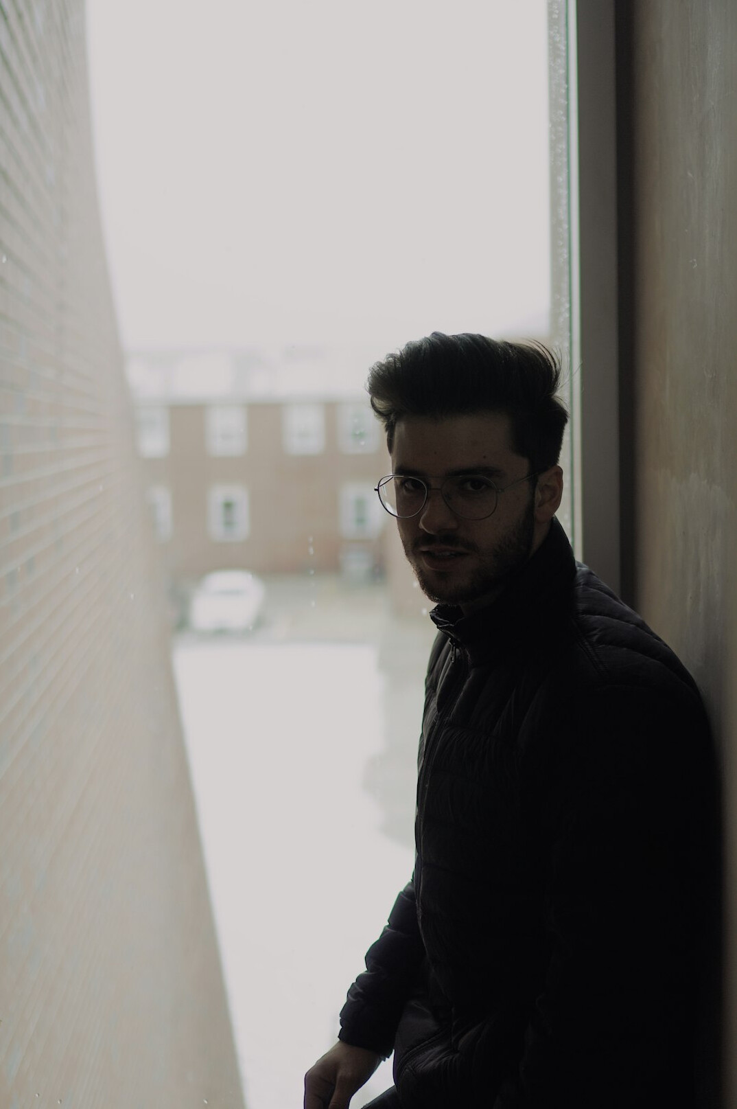 Portrait of a smiling man in a dark blazer