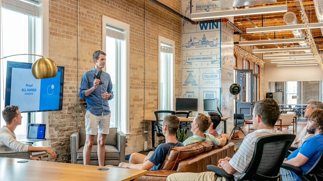 man presenting in meeting